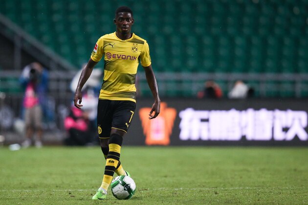 GUANGZHOU, CHINA - JULY 18:  #7 Ousmane Dembele of Borussia Dortmund controls the ball at University Town during the 2017 International Champions Cup football match between AC milan and Borussia Dortmund  Sports Centre Stadium on July 18, 2017 in Guangzhou, China.  (Photo by Zhizhao Wu/Getty Images)