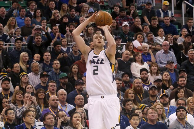 Utah Jazz's Joe Ingles shoots a 3-pointer late in the second half of the team's NBA basketball game against the Orlando Magic on Saturday, Jan. 14, 2017, in Salt Lake City. The Jazz won 114-107. (AP Photo/Kim Raff)