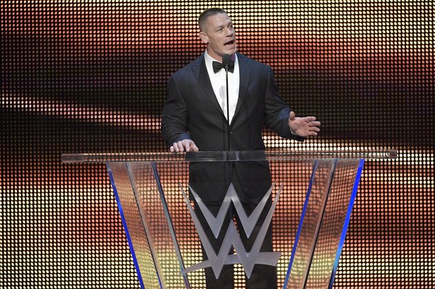 IMAGE DISTRIBUTED FOR WWE - John Cena inducts Kurt Angle into the WWE Hall of Fame as part of the WrestleMania 33 weekend during a ceremony on Friday, March 31, 2017, in Orlando, Fla. (Phelan M. Ebenhack/AP Images for WWE)