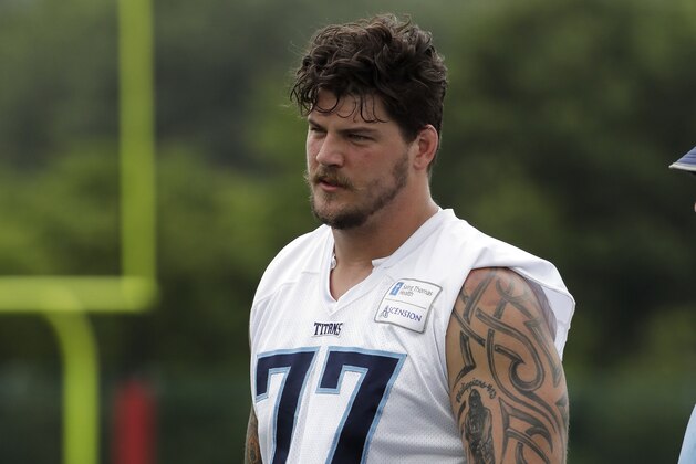 Tennessee Titans tackle Taylor Lewan leaves the field following NFL football minicamp Thursday, June 15, 2017, in Nashville, Tenn. (AP Photo/Mark Humphrey)