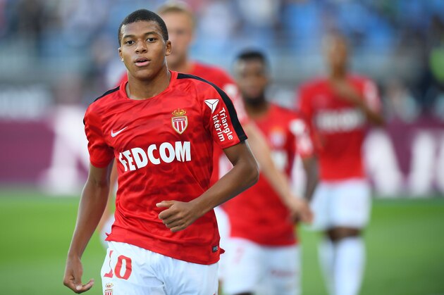 Monaco's French forward Kylian Mbappe warms up ahead of the French Trophy of Champions (Trophee des Champions) football match between Monaco (ASM) and Paris Saint-Germain (PSG) on July 29, 2017, at the Grand Stade in Tangiers. / AFP PHOTO / FRANCK FIFE        (Photo credit should read FRANCK FIFE/AFP/Getty Images)