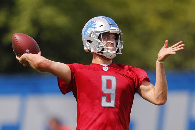 Detroit Lions quarterback Matthew Stafford throws during NFL football training camp in Allen Park, Mich., Sunday, July 30, 2017. (AP Photo/Paul Sancya)