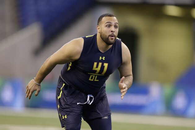 San Diego State offensive lineman Nico Siragusa runs a drill at the NFL football scouting combine in Indianapolis, Friday, March 3, 2017. (AP Photo/Michael Conroy)