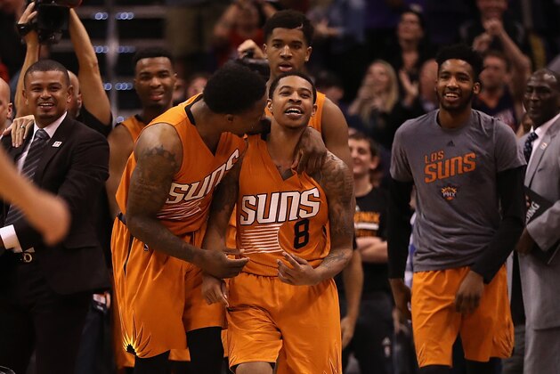 PHOENIX, AZ - MARCH 05:  Tyler Ulis #8 of the Phoenix Suns celebrates with Eric Bledsoe #2 after hitting the game winning three point shot against the Boston Celtics in the NBA game at Talking Stick Resort Arena on March 5, 2017 in Phoenix, Arizona. The Suns defeated the Celtics 109-106. NOTE TO USER: User expressly acknowledges and agrees that, by downloading and or using this photograph, User is consenting to the terms and conditions of the Getty Images License Agreement.  (Photo by Christian Petersen/Getty Images)