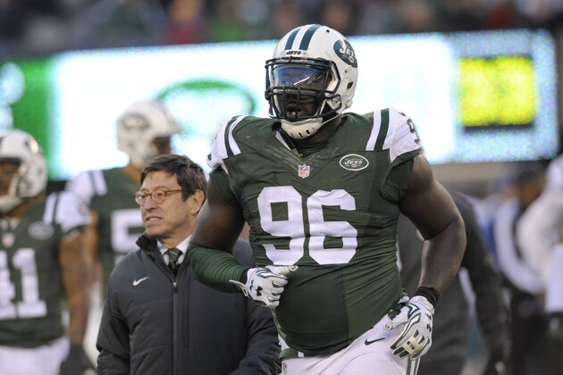 New York Jets defensive end Muhammad Wilkerson (96) leaves the field during the second half of an NFL football game against the Miami Dolphins Sunday, Nov. 29, 2015, in East Rutherford, N.J. (AP Photo/Bill Kostroun)