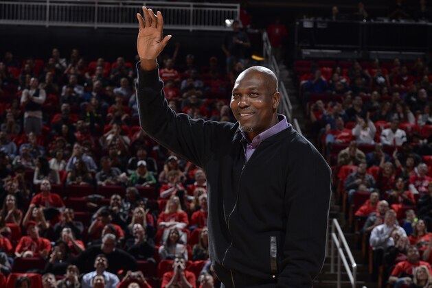 HOUSTON, TX - FEBRUARY 3:  NBA Legend, Hakeem Olajuwon waves to the crowd during the Yao Ming jersey retirement ceremony during the Chicago Bulls game against the Houston Rockets on February 3, 2017 at the Toyota Center in Houston, Texas. NOTE TO USER: User expressly acknowledges and agrees that, by downloading and or using this photograph, User is consenting to the terms and conditions of the Getty Images License Agreement. Mandatory Copyright Notice: Copyright 2017 NBAE (Photo by David Dow/NBAE via Getty Images)