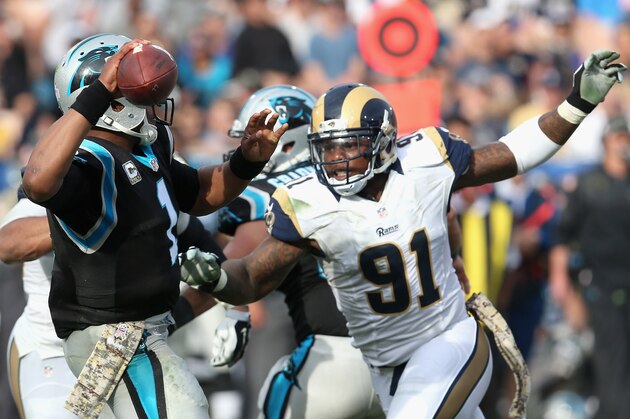 LOS ANGELES, CA - NOVEMBER 06:  Dominique Easley #91 of the Los Angeles Rams reaches for quarterback Cam Newton #1 of the Carolina Panthers during the third quarter of the game at the Los Angeles Coliseum on November 6, 2016 in Los Angeles, California.  (Photo by Stephen Dunn/Getty Images)