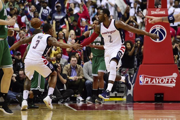 WASHINGTON, DC - MAY 07: John Wall #2 and Bradley Beal #3 of the Washington Wizards celebrate after a basket in the second half against the Boston Celtics in Game Four of the Eastern Conference Semifinals at Verizon Center on May 7, 2017 in Washington, DC. NOTE TO USER: User expressly acknowledges and agrees that, by downloading and or using this photograph, User is consenting to the terms and conditions of the Getty Images License Agreement. (Photo by Patrick McDermott/Getty Images)