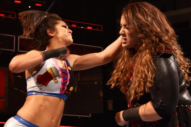 Alexa Bliss (L) and Bayley battle in the ring during the WWE show at Zenith Arena on may 09, 2017 in Lille, France. / AFP PHOTO / PHILIPPE HUGUEN        (Photo credit should read PHILIPPE HUGUEN/AFP/Getty Images)