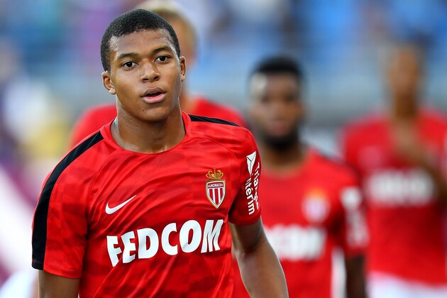 Monaco's French forward Kylian Mbappe warms up ahead of the French Trophy of Champions (Trophee des Champions) football match between Monaco (ASM) and Paris Saint-Germain (PSG) on July 29, 2017, at the Grand Stade in Tangiers. / AFP PHOTO / FRANCK FIFE        (Photo credit should read FRANCK FIFE/AFP/Getty Images)