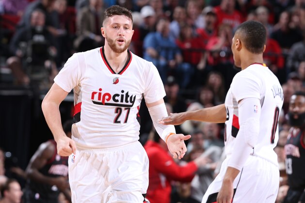 PORTLAND, OR - MARCH 30:  Jusuf Nurkic #27 of the Portland Trail Blazers high fives Damian Lillard #0 during the game against the Houston Rockets on March 30, 2017 at the Moda Center in Portland, Oregon. NOTE TO USER: User expressly acknowledges and agrees that, by downloading and/or using this photograph, user is consenting to the terms and conditions of the Getty Images License Agreement. Mandatory Copyright Notice: Copyright 2017 NBAE (Photo by Sam Forencich/NBAE via Getty Images)