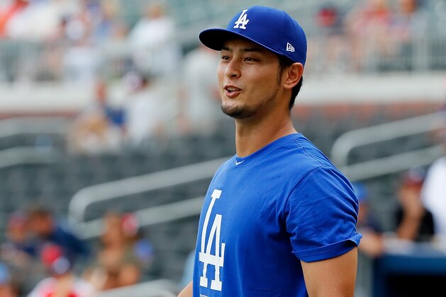 ATLANTA, GA - AUGUST 02:  Yu Darvish #21 of the Los Angeles Dodgers warms up during batting practice at SunTrust Park prior to the game against the Atlanta Braves on August 2, 2017 in Atlanta, Georgia.  (Photo by Kevin C. Cox/Getty Images)