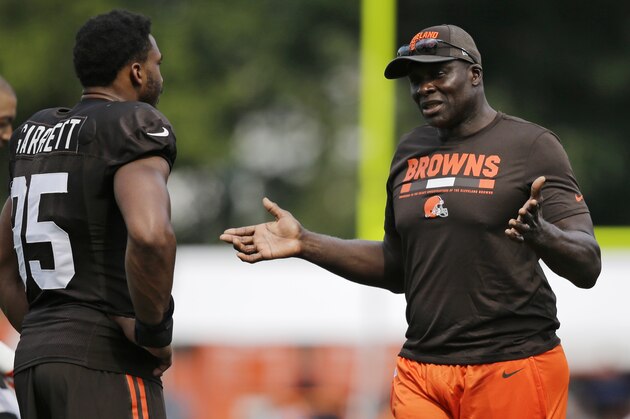 NFL Hall of Famer Bruce Smith, right, talks with Myles Garrett during practice at the NFL football team's training camp facility, Wednesday, Aug. 2, 2017, in Berea, Ohio. (AP Photo/Tony Dejak)