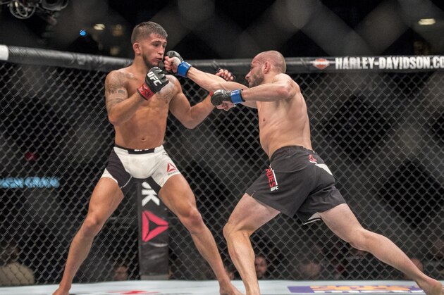 Apr 23, 2016; Las Vegas, NV, USA; Sergio Pettis (red gloves) competes against Chris Kelades (blue gloves) during UFC 197 at MGM Grand Garden Arena. Mandatory Credit: Joshua Dahl-USA TODAY Sports Apr 23, 2016; Las Vegas, NV, USA; Sergio Pettis (red gloves) competes against Chris Kelades (blue gloves) during UFC 197 at MGM Grand Garden Arena. Mandatory Credit: Joshua Dahl-USA TODAY Sports