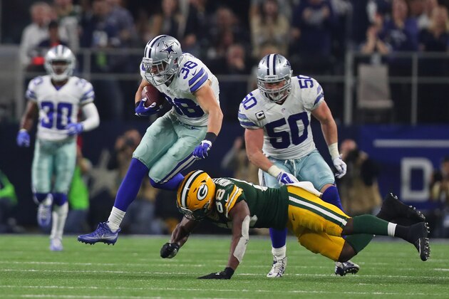 ARLINGTON, TX - JANUARY 15:  Jeff Heath #38 of the Dallas Cowboys runs after intercepting a pass from Aaron Rodgers #12 of the Green Bay Packers during the third quarter in the NFC Divisional Playoff game at AT&T Stadium on January 15, 2017 in Arlington, Texas.  (Photo by Tom Pennington/Getty Images)