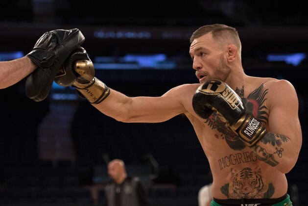 NEW YORK, NY - NOVEMBER 09:  UFC featherweight champion Conor McGrregor of Ireland holds an open training session for the media and fans inside Madison Square Garden on November 9, 2016 in New York City. (Photo by Brandon Magnus/Zuffa LLC/Zuffa LLC via Getty Images)