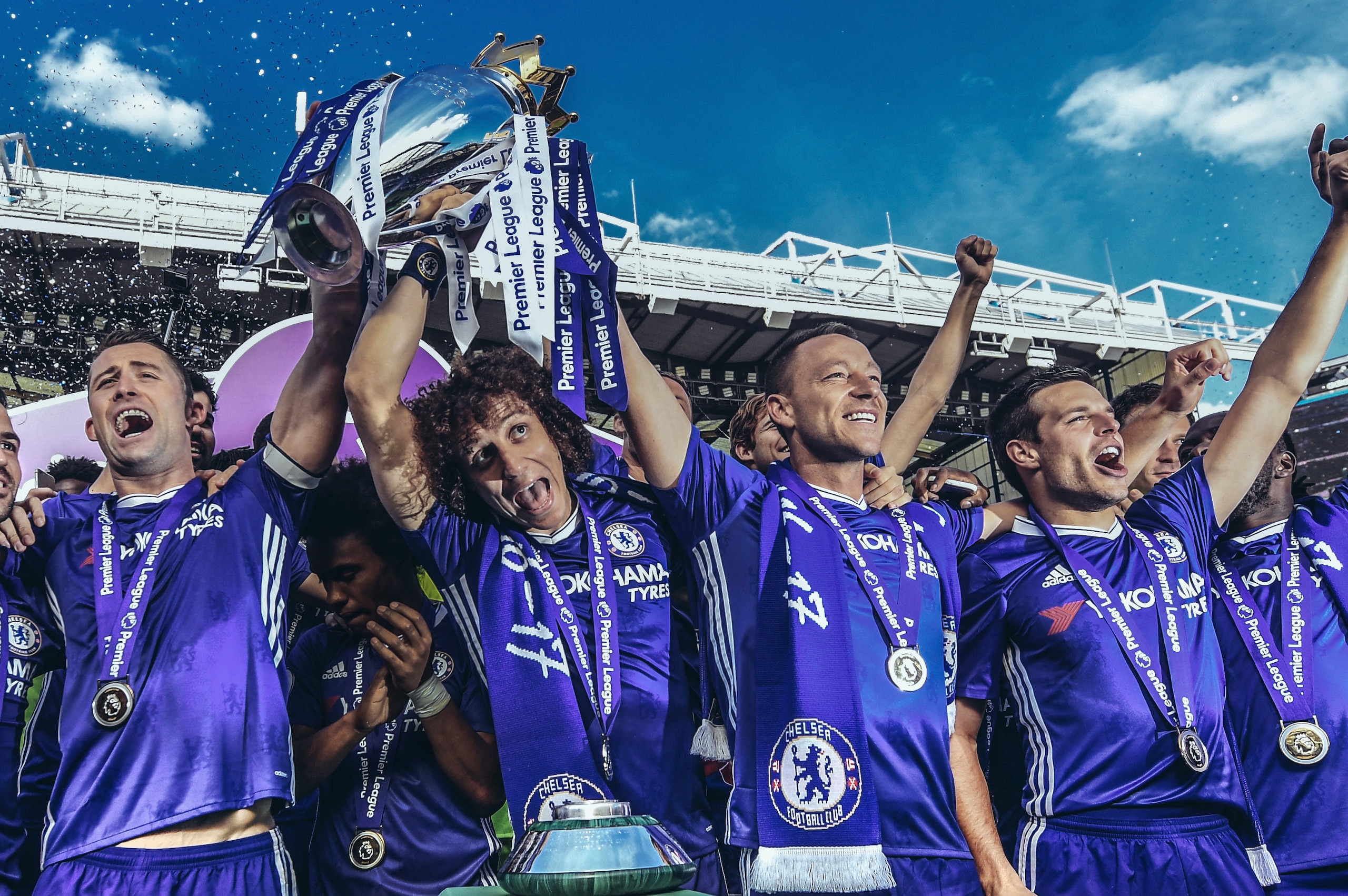LONDON, ENGLAND - MAY 21: (EDITORS NOTE - Digital filters have been used on this image) Cesc Fabregas, Gary Cahill, David Luiz, John Terry and Cesar Azpilicueta of Chelsea celebrate with the Premier League Trophy after the Premier League match between Chelsea and Sunderland at Stamford Bridge on May 21, 2017 in London, England. (Photo by Michael Regan/Getty Images) LONDON, ENGLAND - MAY 21: (EDITORS NOTE - Digital filters have been used on this image) Cesc Fabregas, Gary Cahill, David Luiz, John Terry and Cesar Azpilicueta of Chelsea celebrate with the Premier League Trophy after the Premier League match between Chelsea and Sunderland at Stamford Bridge on May 21, 2017 in London, England. (Photo by Michael Regan/Getty Images)