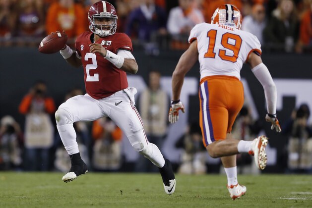 Alabama's Jalen Hurts scrambles during the second half of the NCAA college football playoff championship game against Clemson Monday, Jan. 9, 2017, in Tampa, Fla. (AP Photo/John Bazemore)