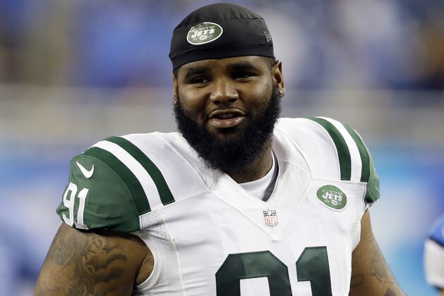 FILE - In this Aug. 13, 2015, file photo, New York Jets defensive end Sheldon Richardson walks off the field following an NFL preseason football game against the Detroit Lions in Detroit. A lapse in judgment cost Richardson the first four games of the season, the result of an NFL-issued suspension for violating the league's substance abuse policy.  (AP Photo/Duane Burleson, File)