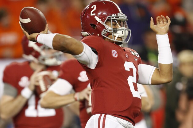 Alabama's Jalen Hurts warms up before the NCAA college football playoff championship game against Clemson Monday, Jan. 9, 2017, in Tampa, Fla. (AP Photo/John Bazemore)