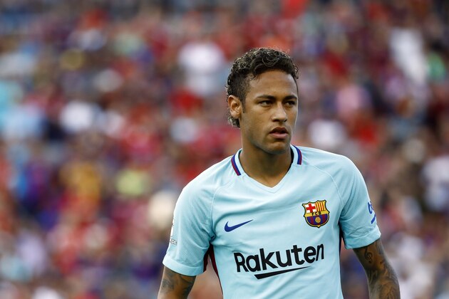 Barcelona forward Neymar walks on the field before an International Champions Cup soccer match against Manchester United, Wednesday, July 26, 2017, in Landover, Md. (AP Photo/Patrick Semansky)
