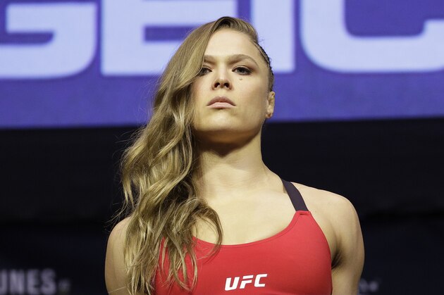 Ronda Rousey stands on stage during an event for UFC 207, Thursday, Dec. 29, 2016, in Las Vegas. Rousey is scheduled to fight Amanda Nunes in a mixed martial arts women's bantamweight championship bout Saturday in Las Vegas. (AP Photo/John Locher)