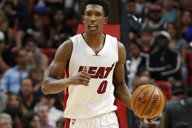 Miami Heat’s Josh Richardson (0) brings the ball up court  against the New York Knicks during the second half of an NBA basketball game, Friday, March 31, 2017, in Miami. The Knicks defeated the Heat 98-94. (AP Photo/Joel Auerbach)