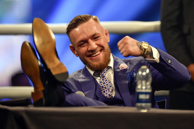 Jul 14, 2017; London, United Kingdom;   Conor McGregor reacts during a world tour press conference to promote the upcoming Mayweather vs McGregor boxing fight at SSE Arena. Mandatory Credit: Steve Flynn-USA TODAY Sports