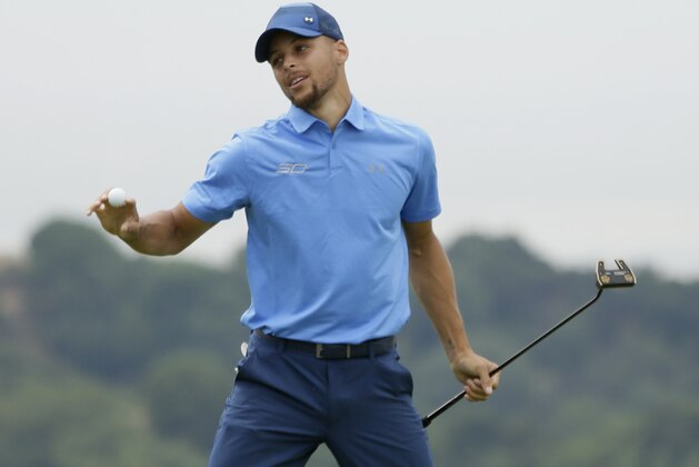 Golden State Warriors NBA basketball player Stephen Curry reacts after making a putt to save par on the 18th green during the Web.com Tour's Ellie Mae Classic golf tournament Thursday, Aug. 3, 2017, in Hayward, Calif. (AP Photo/Eric Risberg)