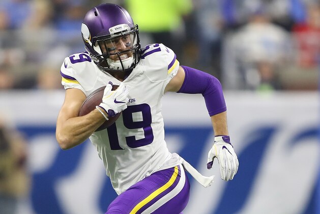 DETROIT, MI - NOVEMBER 24: Adam Thielen #19 of the Minnesota Vikings scrambles for a short gain during the first quarter of the game against the Detroit Lions at Ford Field on November 24, 2016 in Detroit, Michigan. Detroit defeated Minnesota 16-13. (Photo by Leon Halip/Getty Images)