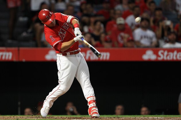 ANAHEIM, CA - AUGUST 02:  Mike Trout #27 of the Los Angeles Angels of Anaheim connects for a two-run homerun during the third  inning of a game against the Philadelphia Phillies  at Angel Stadium of Anaheim on August 2, 2017 in Anaheim, California.  (Photo by Sean M. Haffey/Getty Images)