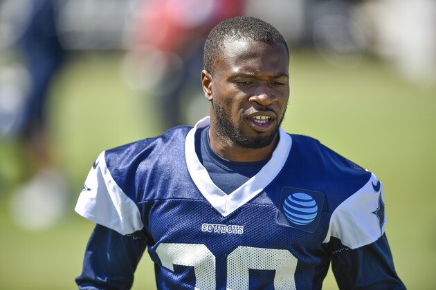 Dallas Cowboys cornerback Anthony Brown walks back to the huddle after running a special teams play during NFL football training camp in Oxnard, Calif., Tuesday, July 26, 2017. (AP Photo/Gus Ruelas)