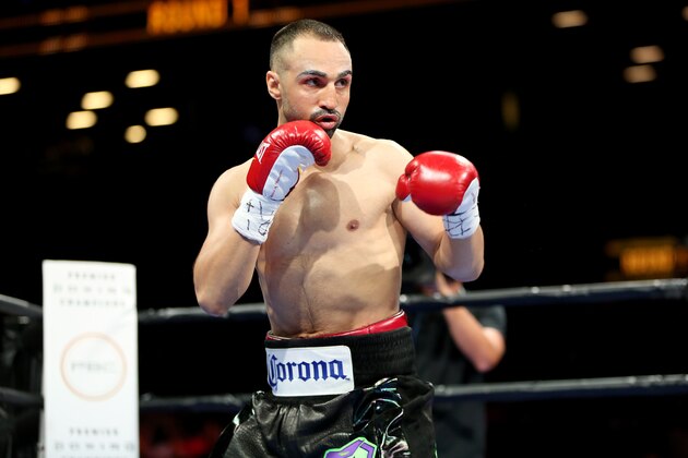 Paul Malignaggi in action against Danny Garcia during their welterweight fight at the Barclays Center in Brooklyn, on Saturday, August 1, 2015. Garcia won via TKO in Round 9.  (AP Photo/Gregory Payan)