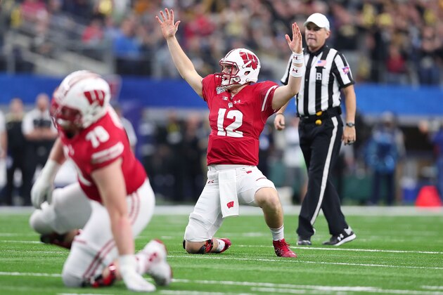 ARLINGTON, TX - JANUARY 02: Alex Hornibrook #12 of the Wisconsin Badgers celebrates after a touchdown in the fourth quarter during the 81st Goodyear Cotton Bowl Classic between Western Michigan and Wisconsin at AT&T Stadium on January 2, 2017 in Arlington, Texas.  (Photo by Tom Pennington/Getty Images)