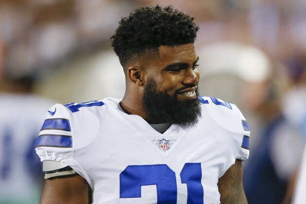 Dallas Cowboys running back Ezekiel Elliott (21) smiles on the sideling during the first half of the Pro Football Hall of Fame NFL preseason game against the Arizona Cardinals in Canton, Ohio, Thursday, Aug. 3, 2017. (AP Photo/Ron Schwane) Dallas Cowboys running back Ezekiel Elliott (21) smiles on the sideling during the first half of the Pro Football Hall of Fame NFL preseason game against the Arizona Cardinals in Canton, Ohio, Thursday, Aug. 3, 2017. (AP Photo/Ron Schwane)