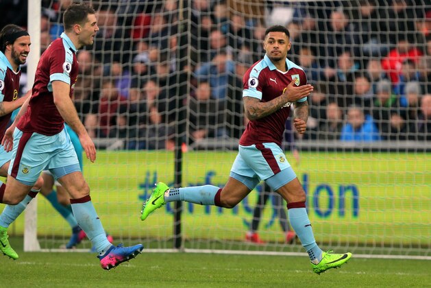 SWANSEA, WALES - MARCH 04: Andre Gray of Burnley celebrates the second goal for his team during the Premier League match between Swansea City and Burnley at The Liberty Stadium on March 4, 2017 in Swansea, Wales. (Photo by Athena Pictures/Getty Images)