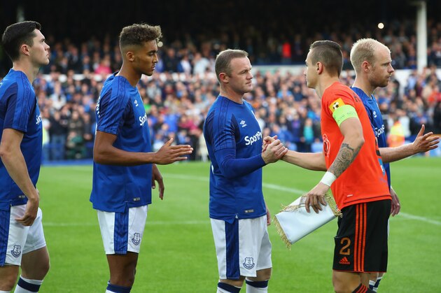 LIVERPOOL, ENGLAND - JULY 27:  Wayne Rooney of Everton shakes hands with Dominik Kruzllak of  MFK Ruzomberok prior to the UEFA Europa League Third Qualifying Round, First Leg match between Everton and MFK Ruzomberok at Goodison Park on July 27, 2017 in Liverpool, England.  (Photo by Clive Brunskill/Getty Images)