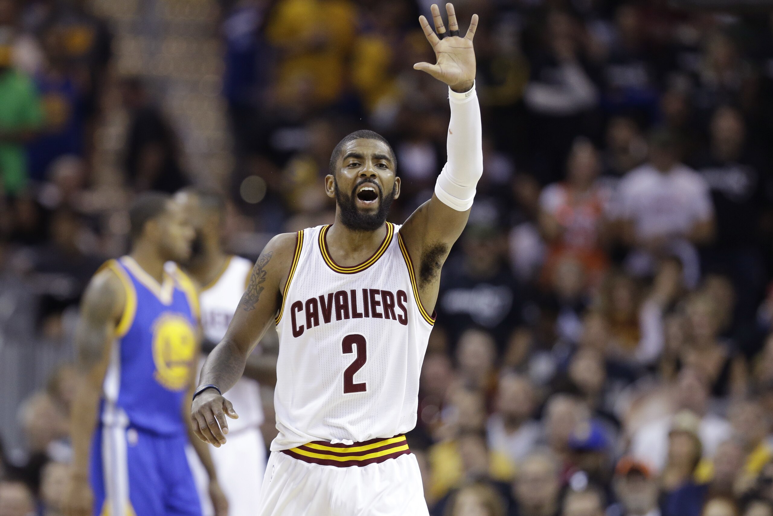 Cleveland Cavaliers guard Kyrie Irving reacts in the first half against the Cleveland Cavaliers in Game 4 of basketball's NBA Finals in Cleveland, Friday, June 9, 2017. (AP Photo/Tony Dejak)