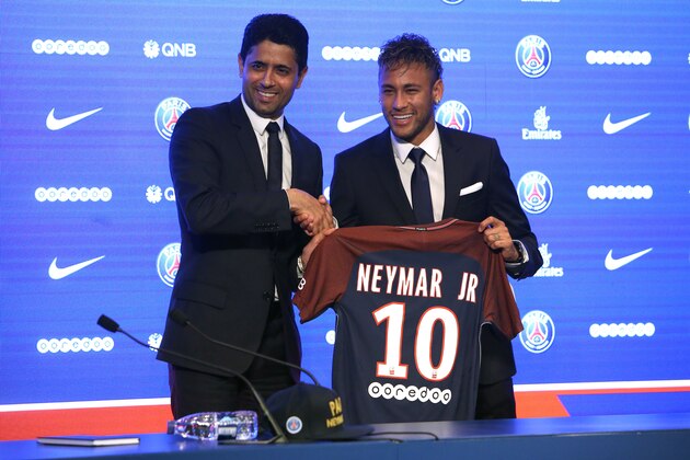 PARIS, FRANCE - AUGUST 4: Neymar Jr of Brazil - here with President of PSG Nasser Al-Khelaifi - during press conference and jersey presentation following his signing as new player of Paris Saint-Germain at Parc des Princes on August 4, 2017 in Paris, France. (Photo by Jean Catuffe/Getty Images)
