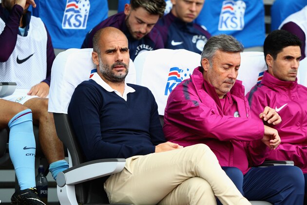 REYKJAVIK, ICELAND - AUGUST 04:  Josep Guardiola, Manager of Manchester City looks on prior to a Pre Season Friendly between Manchester City and West Ham United at the Laugardalsvollur stadium on August 4, 2017 in Reykjavik, Iceland.  (Photo by Ian Walton/Getty Images)