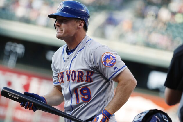 New York Mets' Jay Bruce reacts after being called out on strikes on a pitch from Colorado Rockies starting pitcher Jeff Hoffman in the first inning of a baseball game Tuesday, Aug. 1, 2017, Denver. (AP Photo/David Zalubowski)