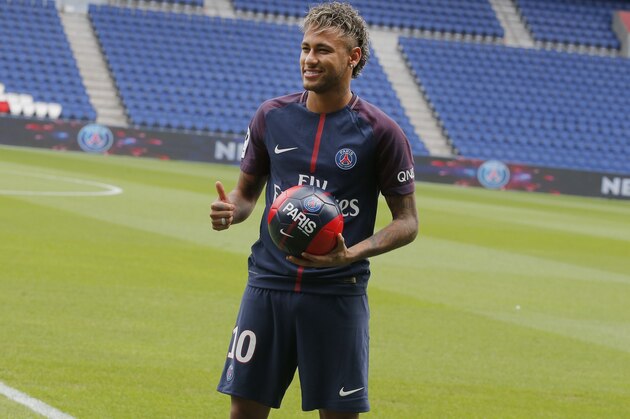 Brazilian soccer star Neymar gives a thump up as he poses following a press conference in Paris Friday, Aug. 4, 2017. Neymar arrived in Paris on Friday the day after he became the most expensive player in soccer history when completing his blockbuster transfer to Paris Saint-Germain from Barcelona for 222 million euros ($262 million). (AP Photo/Michel Euler)