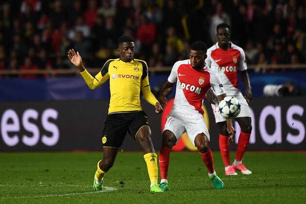 Dortmund's French midfielder Ousmane Dembele (L) and Monaco's French midfielder Thomas Lemar vie for the ball during the UEFA Champions League 2nd leg quarter-final football match AS Monaco v BVB Borussia Dortmund on April 19, 2017 at the Louis II stadium in Monaco.  / AFP PHOTO / BORIS HORVAT        (Photo credit should read BORIS HORVAT/AFP/Getty Images)