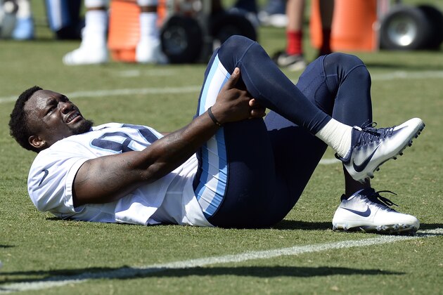 Tennessee Titans wide receiver Corey Davis stretches during NFL football training camp Monday, July 31, 2017, in Nashville, Tenn. (AP Photo/Mark Zaleski)