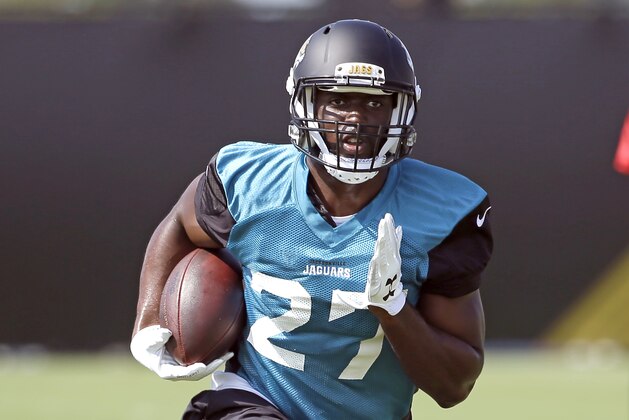 Jacksonville Jaguars running back Leonard Fournette runs through a drill during NFL football training camp, Friday, July 28, 2017, in Jacksonville, Fla. (AP Photo/John Raoux)