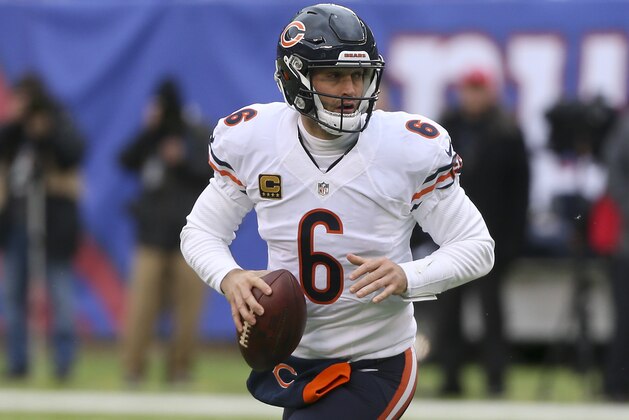 FILE - In this Nov. 20, 2016 file photo, Chicago Bears quarterback Jay Cutler (6) rolls out of the pocket against the New York Giants during the second quarter of an NFL football game in East Rutherford, N.J. Cutler will have season-ending surgery on his right shoulder. Coach John Fox announced Thursday, Dec. 1, that the veteran quarterback will have an operation to repair the labrum in his shoulder. (AP Photo/Seth Wenig, File)