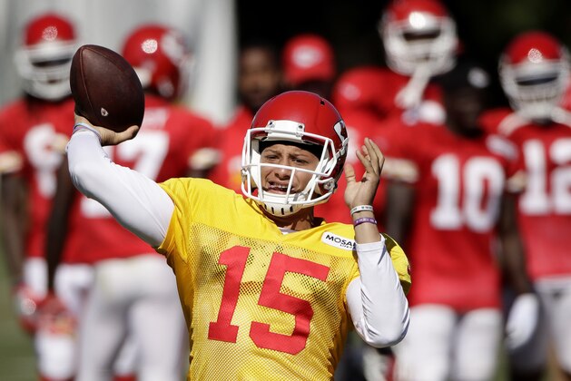 Kansas City Chiefs quarterback Patrick Mahomes (15) throws during NFL football training camp Friday, Aug. 4, 2017, in St. Joseph, Mo. (AP Photo/Charlie Riedel)
