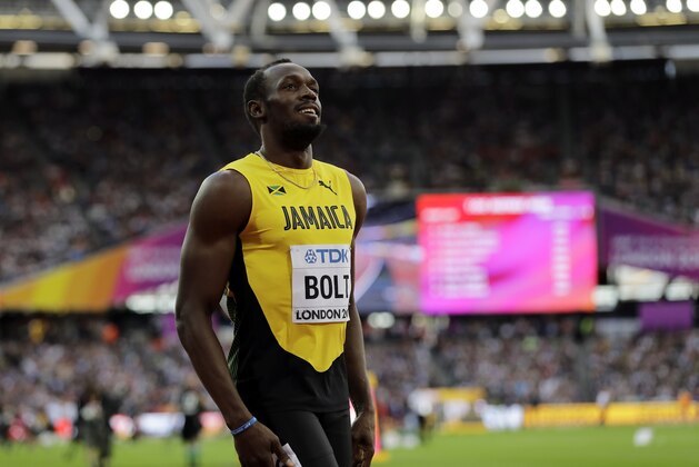 Jamaica's Usain Bolt smiles after finishing his Men's 100 meters semifinal during the World Athletics Championships in London Saturday, Aug. 5, 2017. (AP Photo/Tim Ireland)