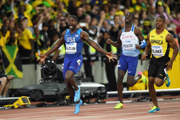 LONDON, ENGLAND - AUGUST 05:  Justin Gatlin of the United States raises his arms as he crosses the line to win the Men's 100 metres final in 9.92 seconds during day two of the 16th IAAF World Athletics Championships London 2017 at The London Stadium on August 5, 2017 in London, United Kingdom.  (Photo by Shaun Botterill/Getty Images)