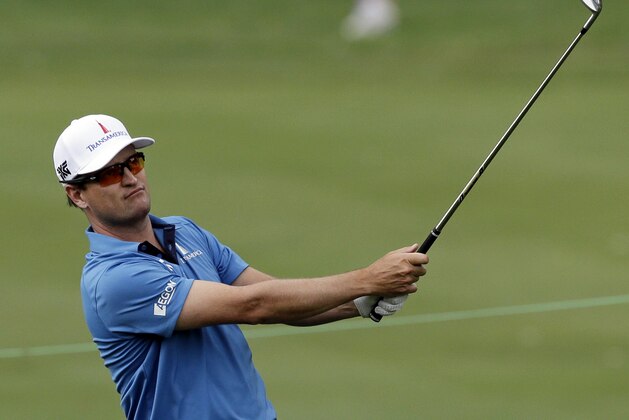 Zach Johnson hits to the 17th green from the fairway during the second round of the Bridgestone Invitational golf tournament at Firestone Country Club, Friday, Aug. 4, 2017, in Akron, Ohio. (AP Photo/Tony Dejak)